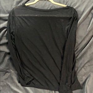 Sheer black long sleeve t-shirt.